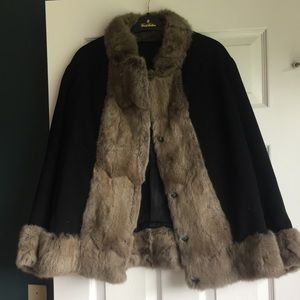 Black tailor made jacket with silvery fur